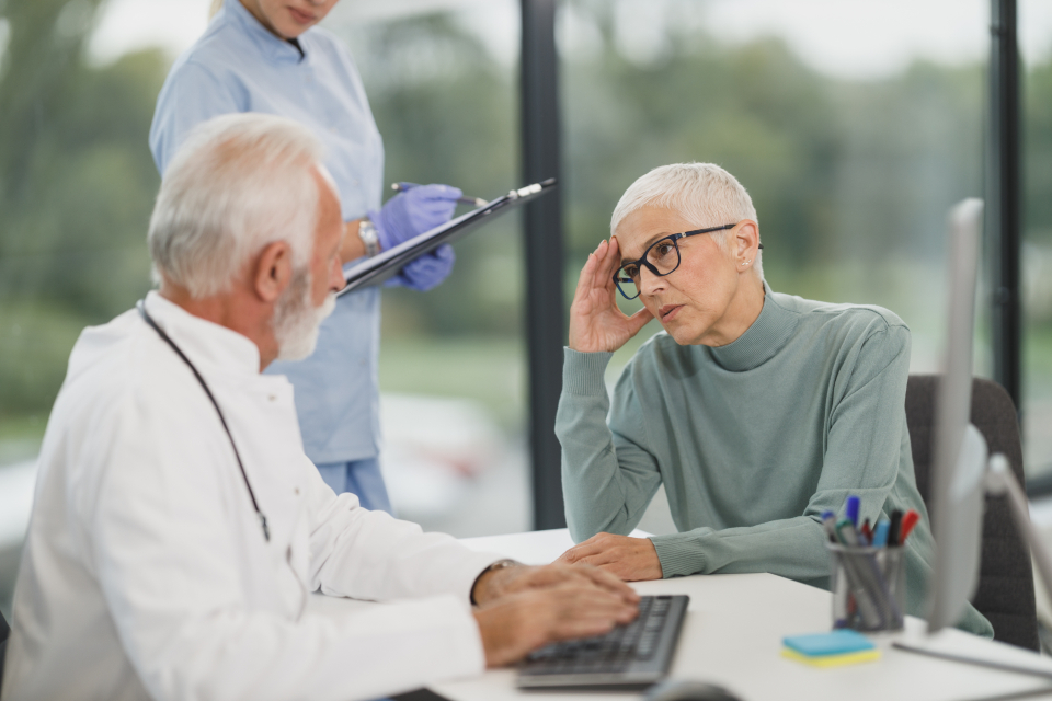 A physician meeting with a patient